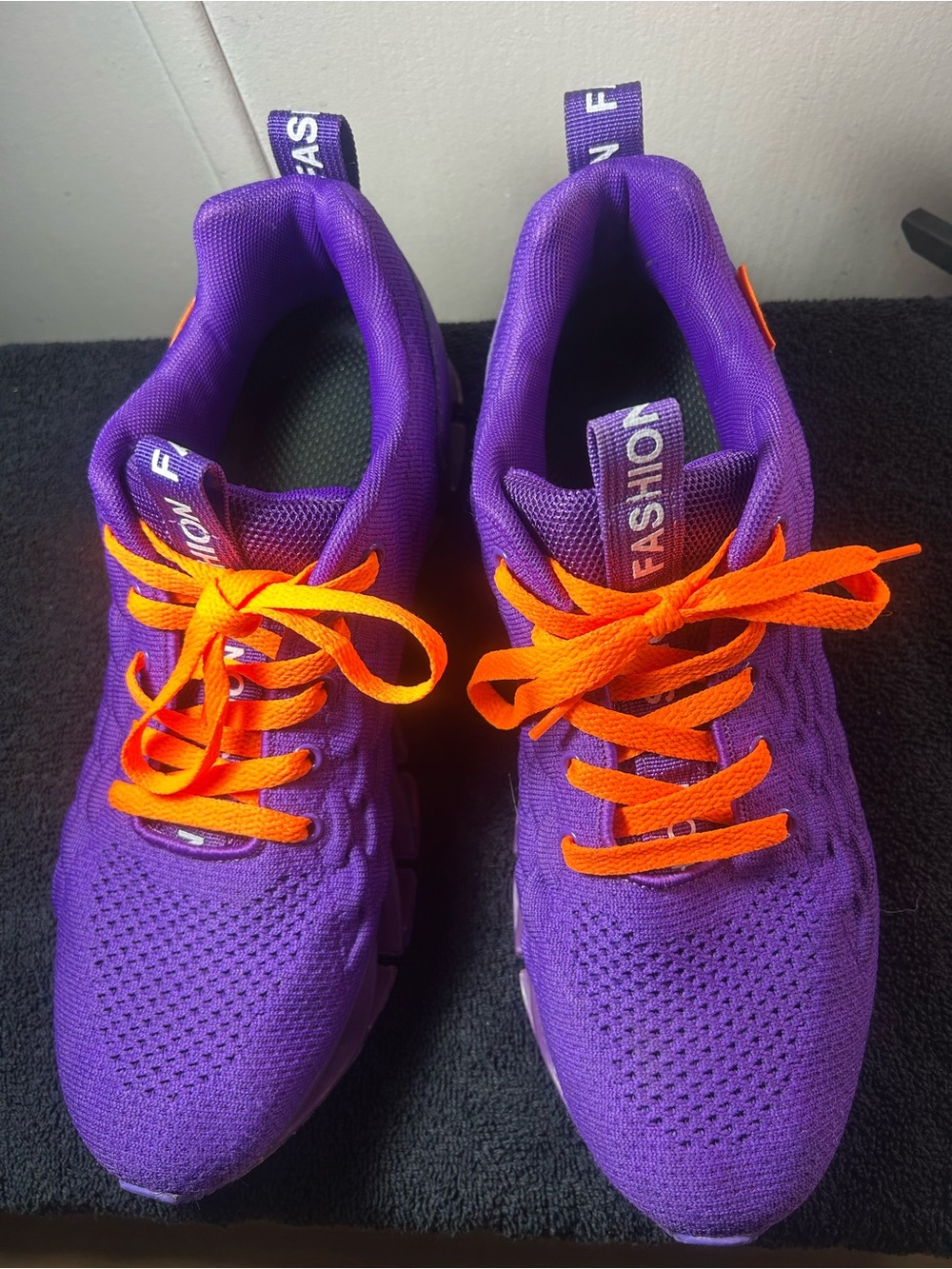 Purple Knit Sneakers with Bright Orange Laces
Size 10.5 or 11s